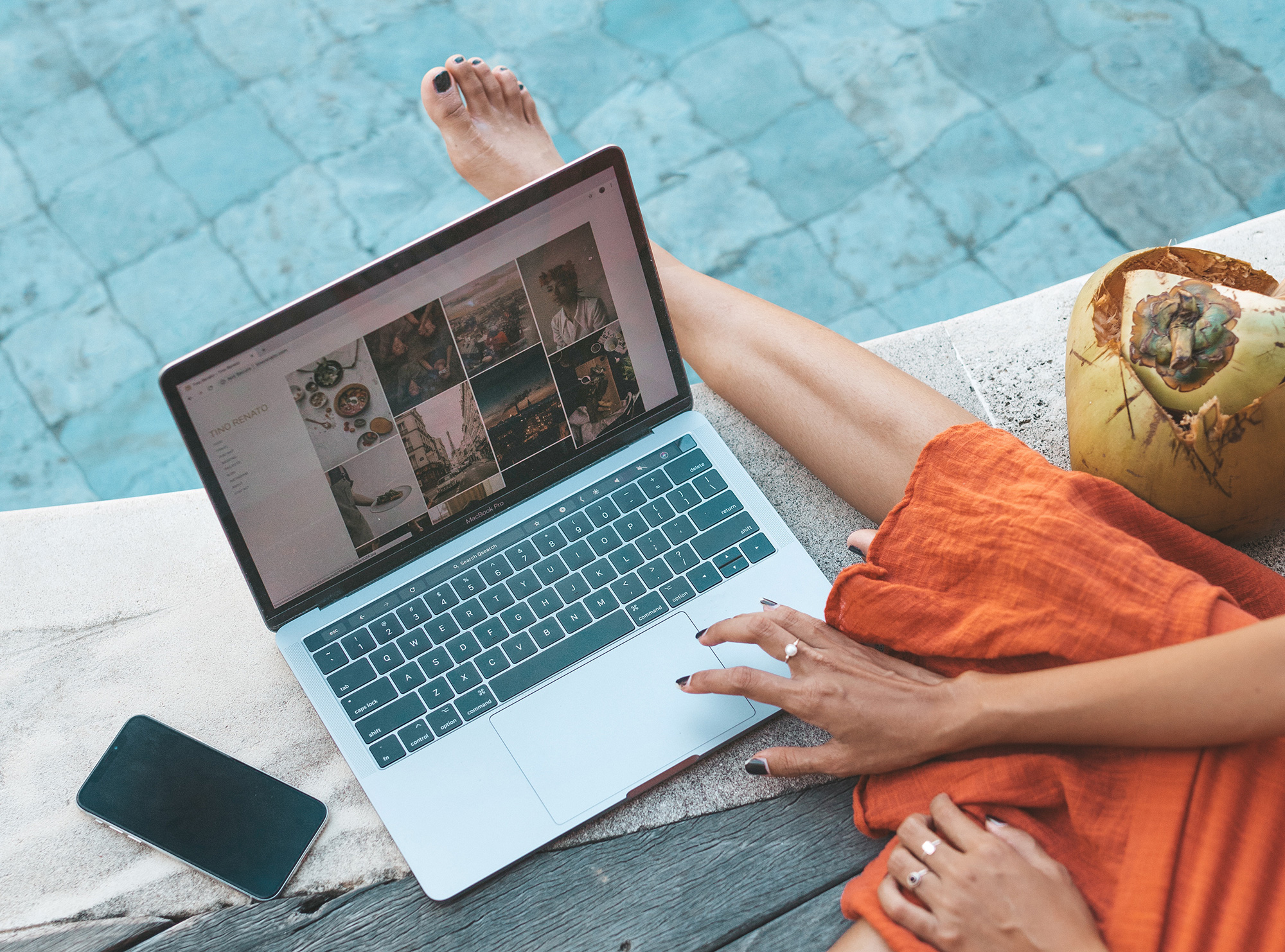 girl working by the pool